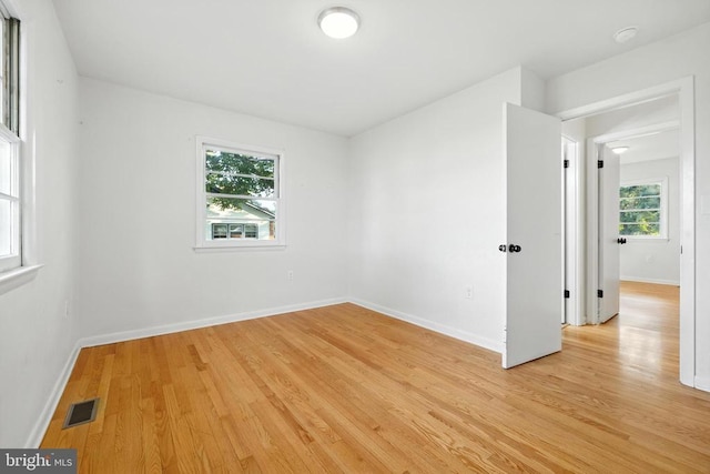 6 Charles St, Luray, VA 22835 - empty room featuring light wood-style floors and a smoke detector