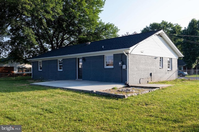 6 Charles St, Luray, VA 22835 - rear view of property featuring a patio area and brick siding