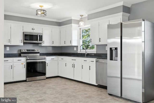 6 Charles St, Luray, VA 22835 - kitchen featuring stainless steel appliances, white cabinets, pendant lighting, and ornamental molding