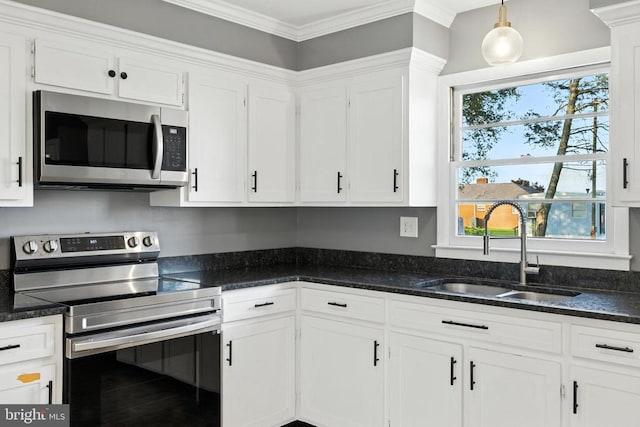 6 Charles St, Luray, VA 22835 - kitchen featuring stainless steel appliances, white cabinetry, ornamental molding, and dark stone countertops