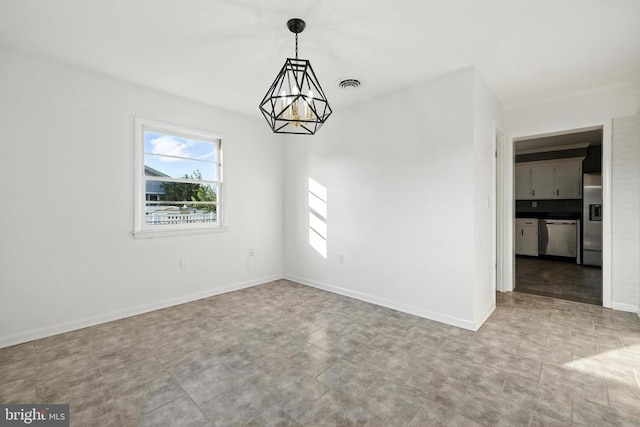 6 Charles St, Luray, VA 22835 - spare room featuring a chandelier and baseboards
