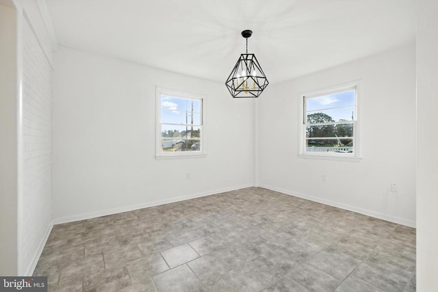 6 Charles St, Luray, VA 22835 - unfurnished room featuring a chandelier and baseboards
