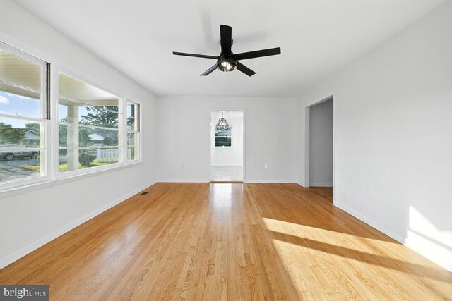 6 Charles St, Luray, VA 22835 - empty room featuring light wood-style floors and a ceiling fan