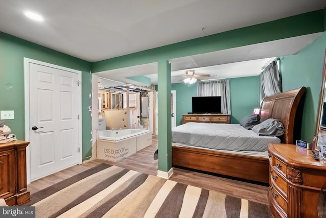  - bedroom with wood finished floors