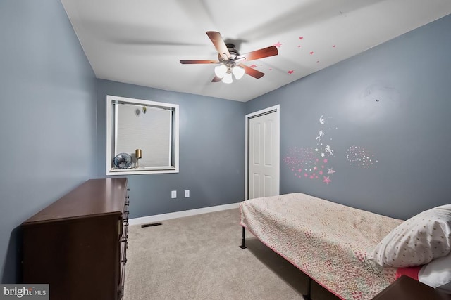  - bedroom with carpet floors, a closet, and ceiling fan
