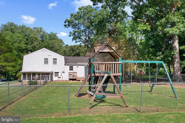  - view of play area with a fenced backyard and a wooden deck