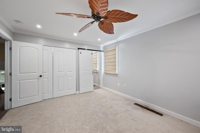  - unfurnished bedroom featuring carpet floors, crown molding, recessed lighting, and ceiling fan