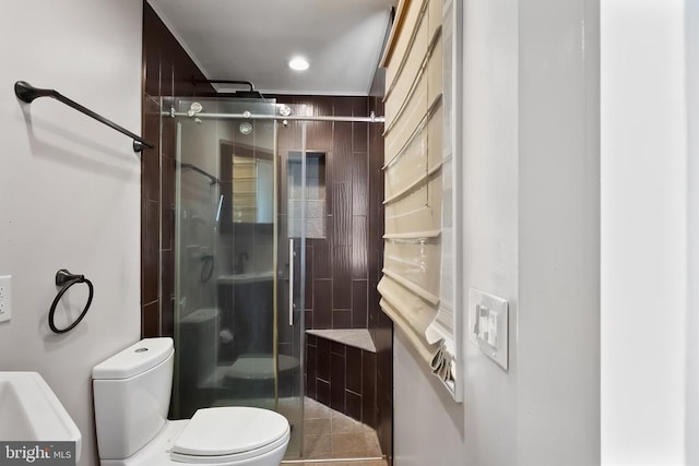  - bathroom featuring a stall shower, tile patterned floors, and recessed lighting