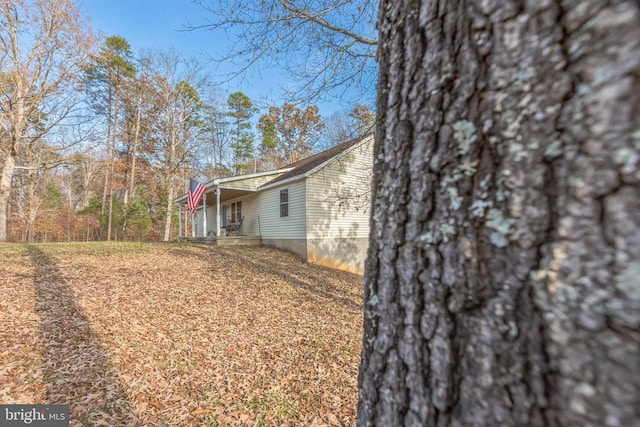 7599 Secretarys Sand Rd, Schuyler, VA 22969 - view of property exterior featuring covered porch