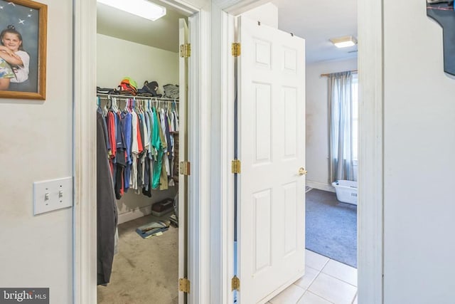 7599 Secretarys Sand Rd, Schuyler, VA 22969 - hall featuring light colored carpet and light tile patterned flooring
