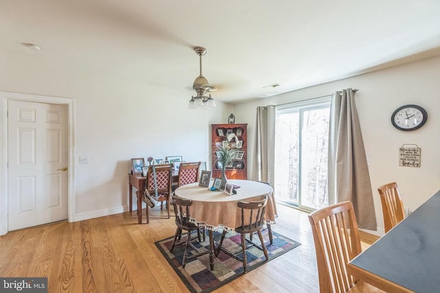 7599 Secretarys Sand Rd, Schuyler, VA 22969 - dining area featuring light wood finished floors, baseboards, and ceiling fan