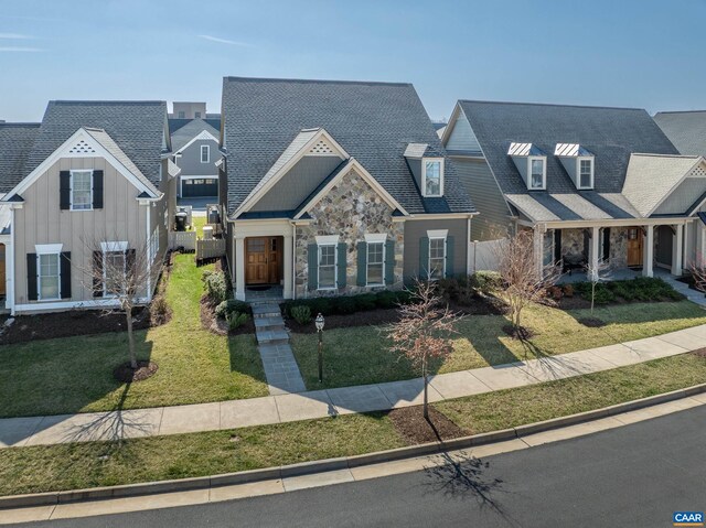 804 Golf View Dr, Crozet, VA 22932 - view of front facade with stone siding, a front lawn, and board and batten siding