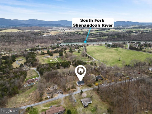 drone / aerial view featuring a mountain view