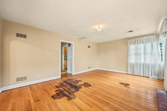 1435 Bluestone St, Harrisonburg, VA 22801 - spare room featuring baseboards and wood finished floors
