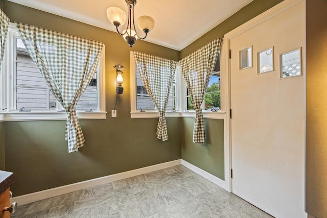 1435 Bluestone St, Harrisonburg, VA 22801 - unfurnished dining area featuring baseboards