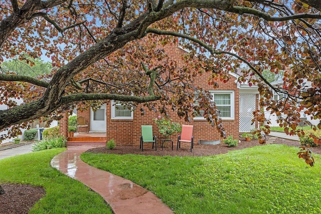1435 Bluestone St, Harrisonburg, VA 22801 - view of front of house with brick siding and a front lawn