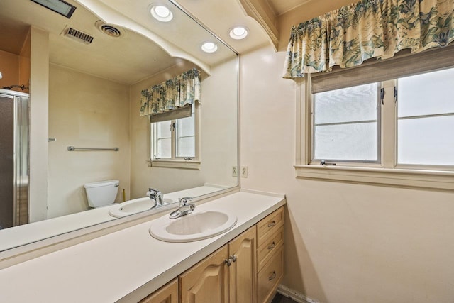 1435 Bluestone St, Harrisonburg, VA 22801 - full bathroom featuring vanity, toilet, a stall shower, and recessed lighting