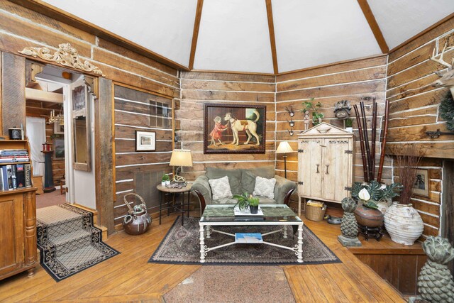 2665 Deerfield Valley Rd, Deerfield, VA 24432 - living room with vaulted ceiling, wood walls, and hardwood / wood-style floors