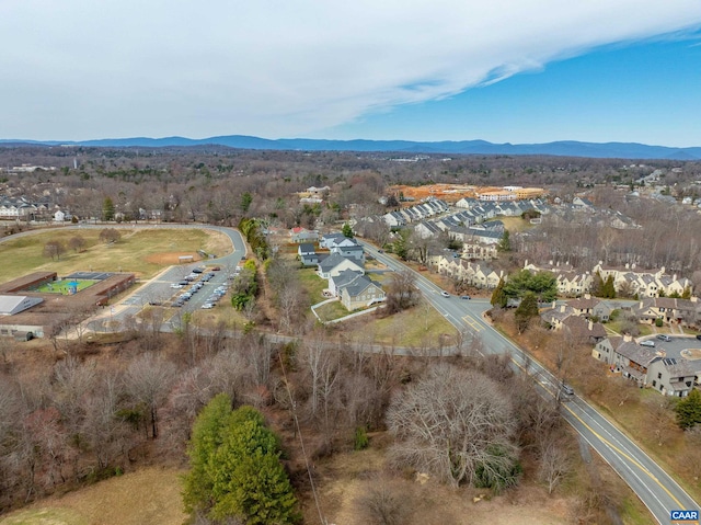 aerial view featuring a mountain view and a residential view