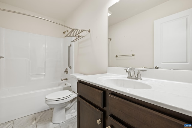 full bathroom featuring tile patterned floors, toilet, vanity, and washtub / shower combination