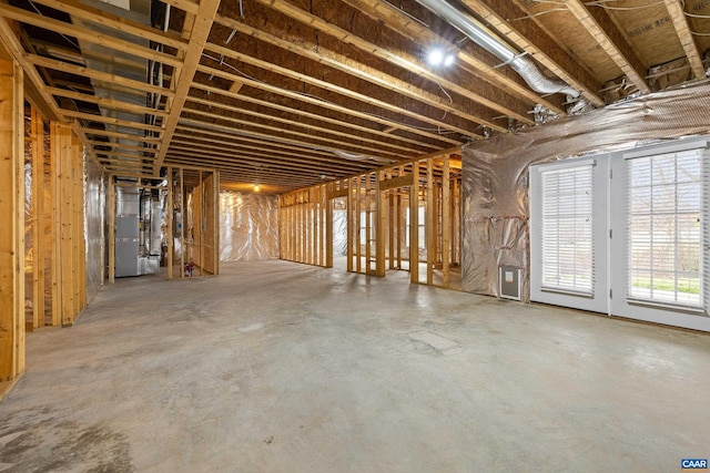 below grade area featuring heating unit