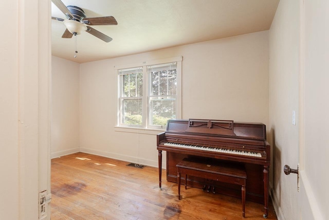 530 Water St W, Harrisonburg, VA 22801 - sitting room featuring wood finished floors, a ceiling fan, and baseboards