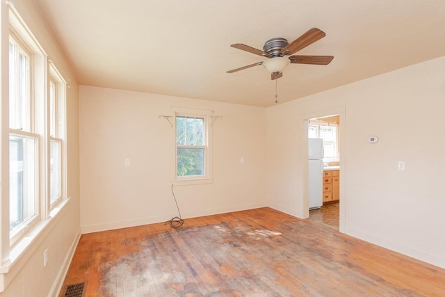 530 Water St W, Harrisonburg, VA 22801 - spare room with a ceiling fan, light wood finished floors, and baseboards
