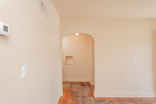 530 Water St W, Harrisonburg, VA 22801 - hallway with arched walkways, wood finished floors, and baseboards