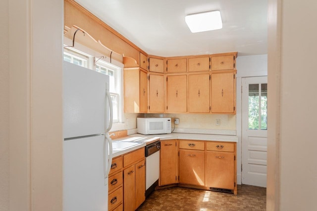 530 Water St W, Harrisonburg, VA 22801 - kitchen featuring white appliances, plenty of natural light, light countertops, and dark flooring