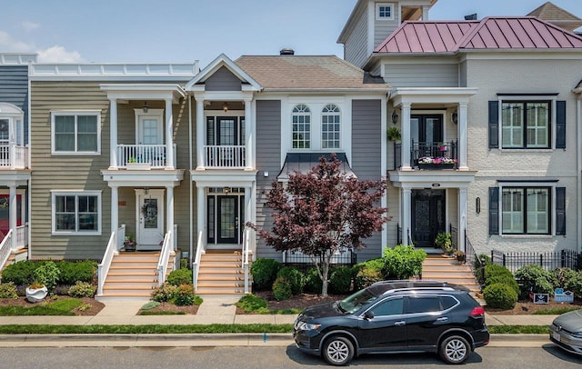 3277 Preston Shore Dr, Rockingham, VA 22801 - view of front of property with a standing seam roof, a balcony, and a metal roof