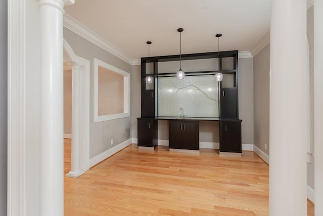 3277 Preston Shore Dr, Rockingham, VA 22801 - bar area with decorative columns, crown molding, light wood-style flooring, and pendant lighting