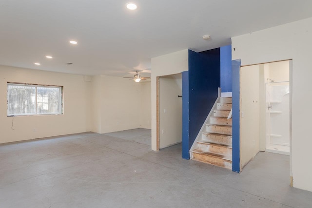 3277 Preston Shore Dr, Rockingham, VA 22801 - empty room with concrete floors, stairway, ceiling fan, recessed lighting, and a smoke detector