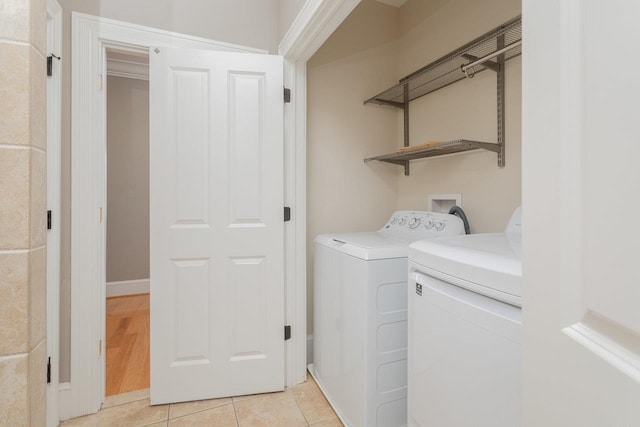 3277 Preston Shore Dr, Rockingham, VA 22801 - laundry room featuring washer and dryer and light tile patterned floors