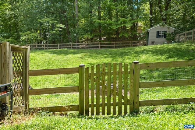 13 Landing Ct, Palmyra, VA 22963 - gate featuring a storage shed and an outdoor structure