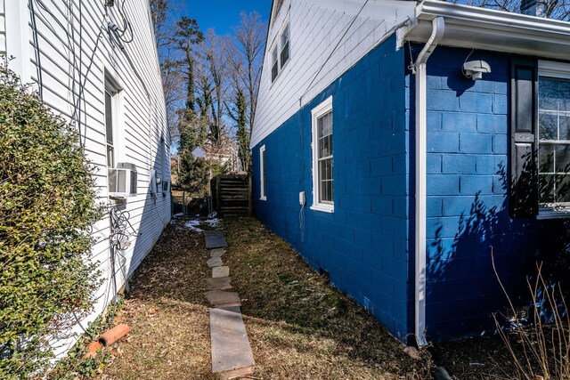 212 Shamrock Rd, Charlottesville, VA 22903 - view of side of home featuring fence and concrete block siding
