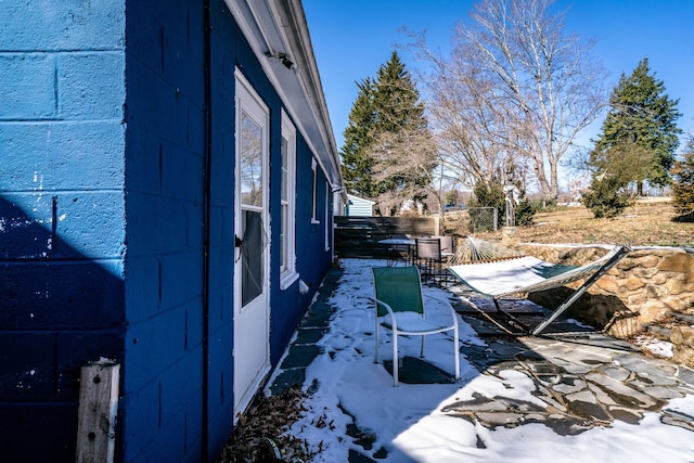 212 Shamrock Rd, Charlottesville, VA 22903 - view of side of property with a patio area, fence, and concrete block siding