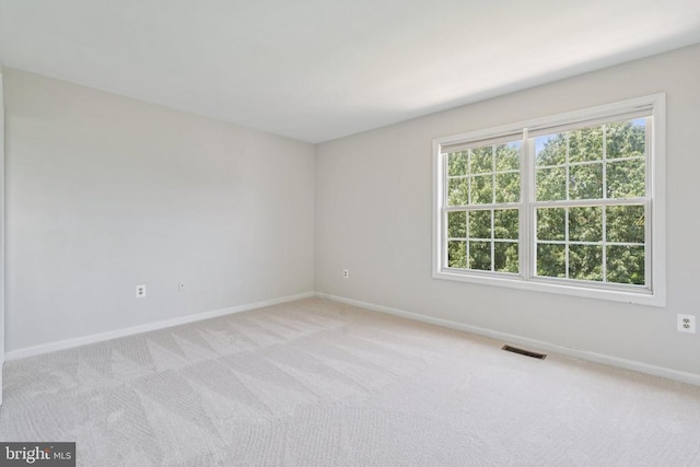546 Highland Towne Ln, Warrenton, VA 20186 - empty room featuring baseboards and light carpet
