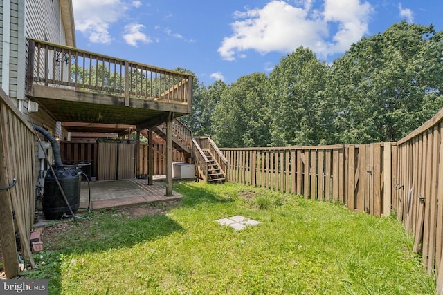546 Highland Towne Ln, Warrenton, VA 20186 - fenced backyard featuring a patio area, a wooden deck, and stairway