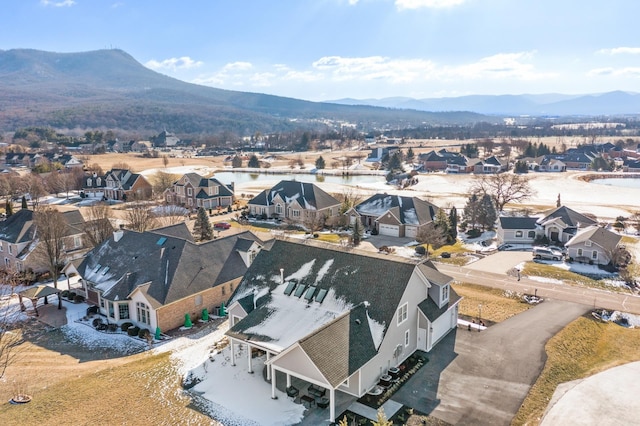 birds eye view of property with a residential view and a mountain view