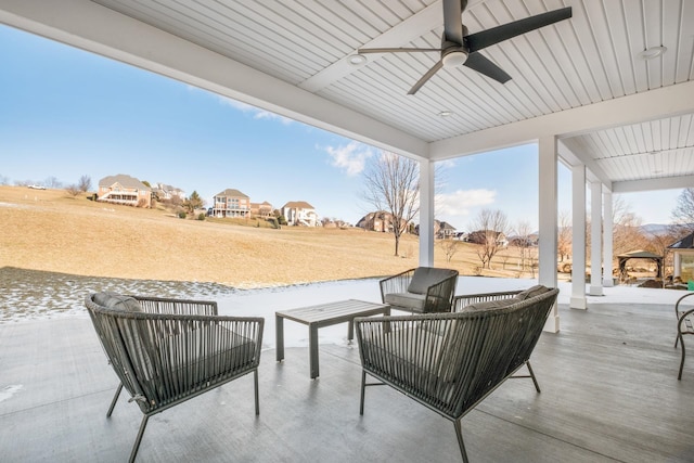 view of patio / terrace featuring a ceiling fan and an outdoor living space