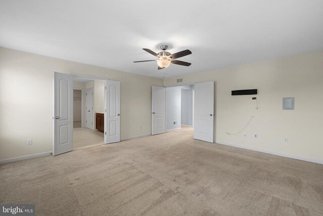 1708 Hudgins Farm Cir, Fredericksburg, VA 22408 - unfurnished bedroom featuring light colored carpet, ensuite bathroom, and a ceiling fan