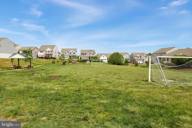 1708 Hudgins Farm Cir, Fredericksburg, VA 22408 - view of yard with a sport area and a residential view