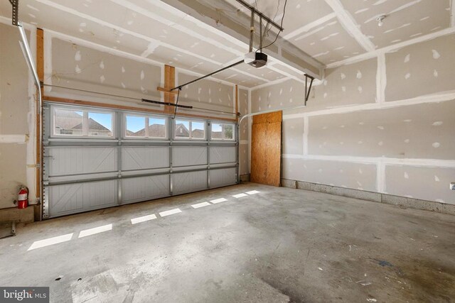 1708 Hudgins Farm Cir, Fredericksburg, VA 22408 - garage featuring a garage door opener