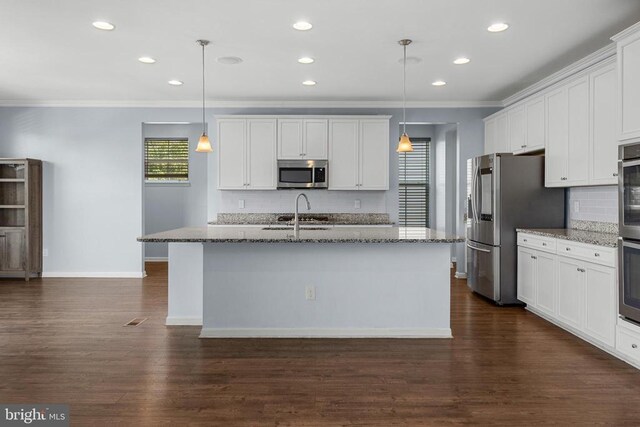 1708 Hudgins Farm Cir, Fredericksburg, VA 22408 - kitchen featuring stainless steel appliances, ornamental molding, tasteful backsplash, stone countertops, and an island with sink