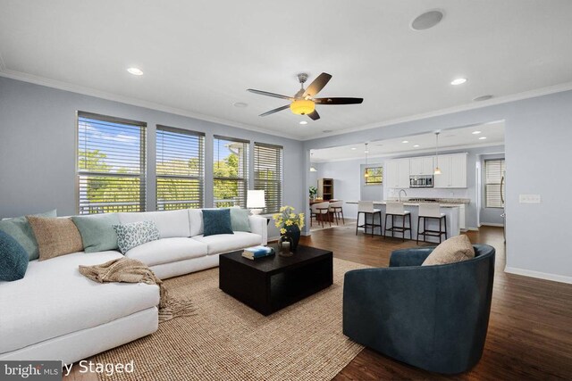 1708 Hudgins Farm Cir, Fredericksburg, VA 22408 - living room featuring ornamental molding, dark wood-style flooring, ceiling fan, and recessed lighting