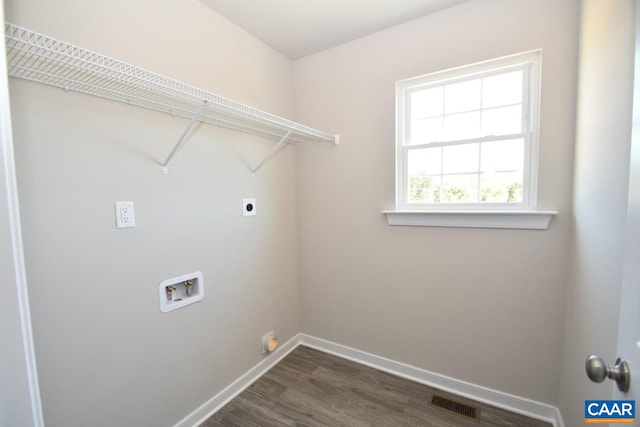 1211 Shenandoah Crossing Dr, Gordonsville, VA 22942 - laundry area featuring laundry area, dark wood finished floors, electric dryer hookup, baseboards, and hookup for a washing machine