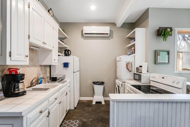409 Lower Rawley Ln, Hinton, VA 22831 - kitchen with a wall mounted AC, white appliances, a sink, open shelves, and stacked washer and clothes dryer