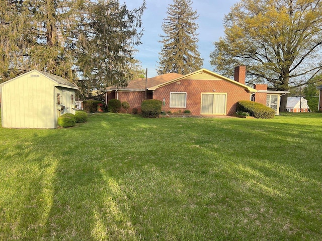 view of yard with a storage unit and an outdoor structure