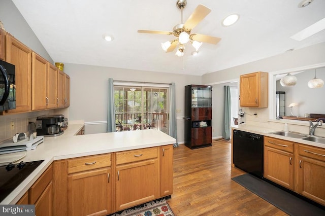 108 Harris Ct, Locust Grove, VA 22508 - kitchen with black appliances, a sink, a peninsula, light countertops, and a ceiling fan