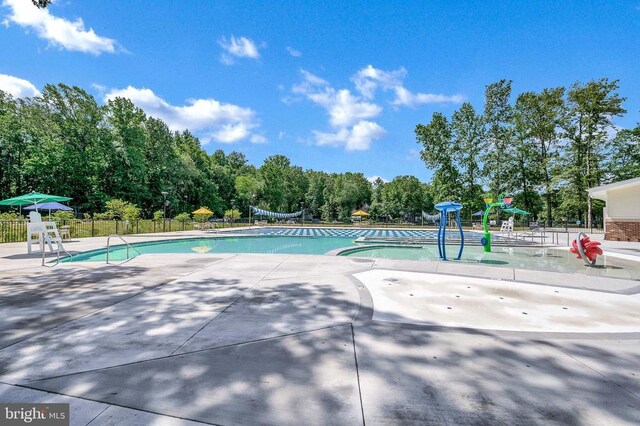 108 Harris Ct, Locust Grove, VA 22508 - community pool featuring fence, a patio, and view of scattered trees